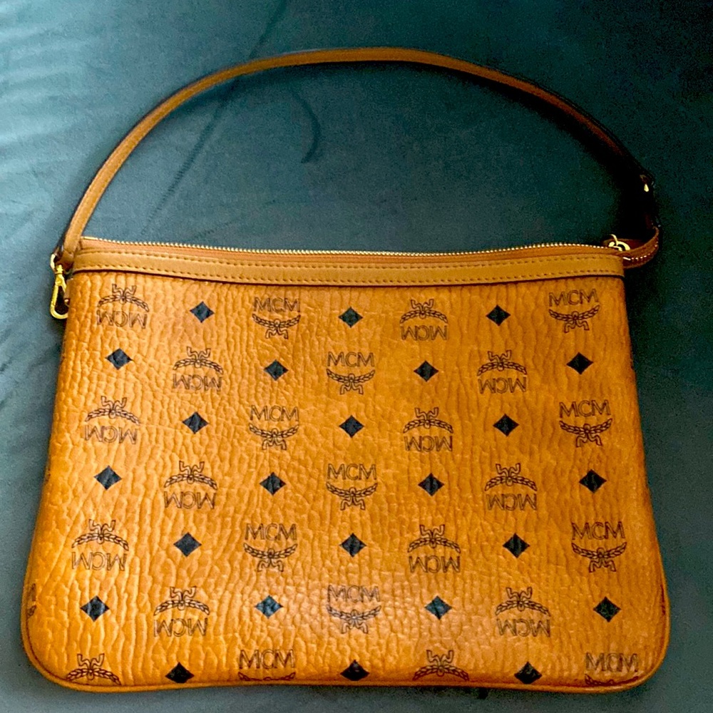 AUTHENTIC MCM COGNAC, excellent condition on the outside, inside slight makeup